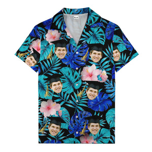 graduation caps tossed over hibiscus blooms on monstera hawaiian shirt