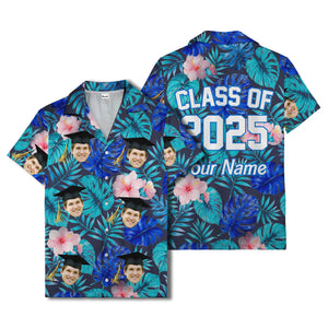 graduation caps tossed over hibiscus blooms on monstera hawaiian shirt